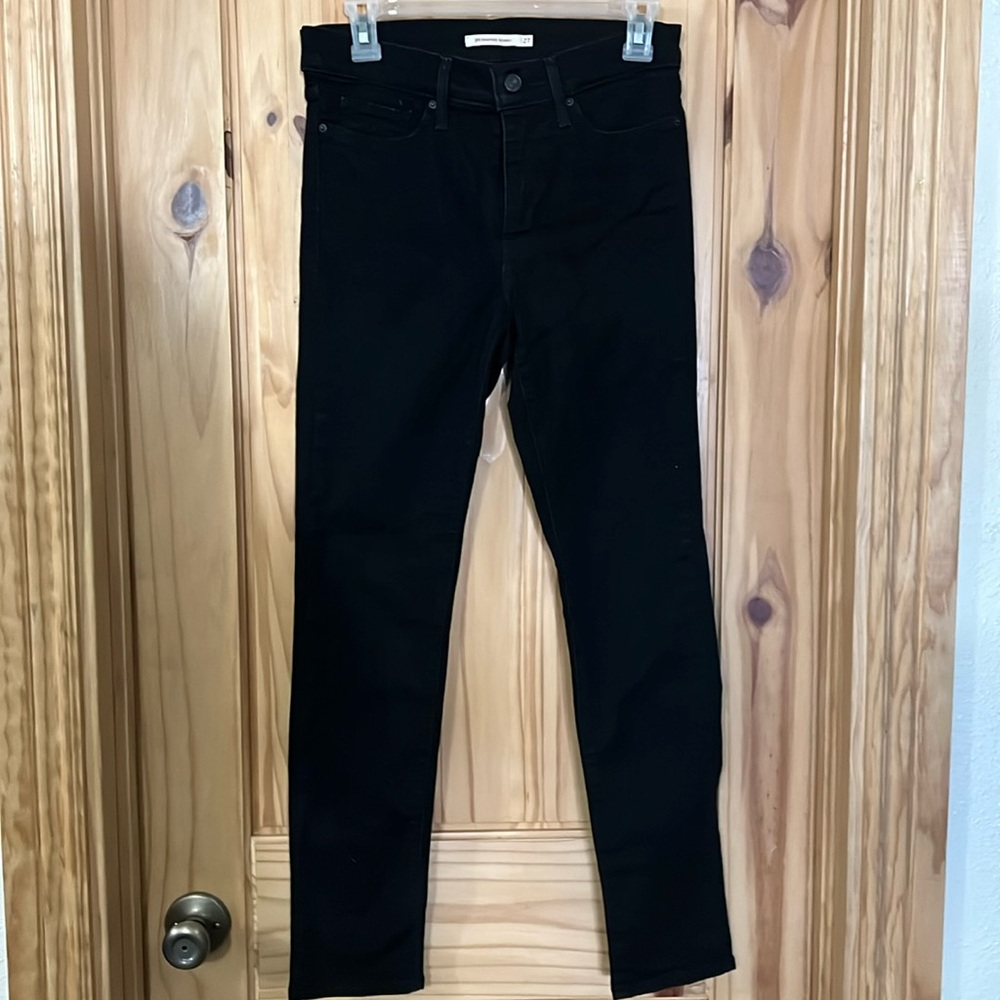 Levi’s black skinny jeans. Size w27L30